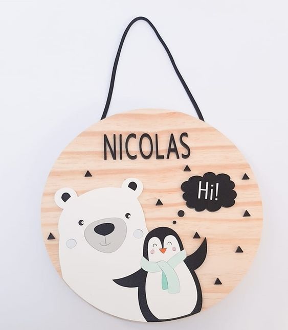 Porta maternidade: pinguim e urso polar